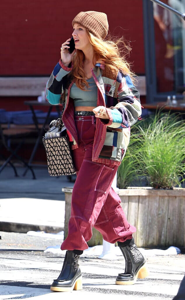IMG_5145-2-2 Blake Lively wearing a patchwork jacket and maroon carpenter pants as Lily Bloom in movie adaptation of Colleen Hoover's book "It Ends with Us"